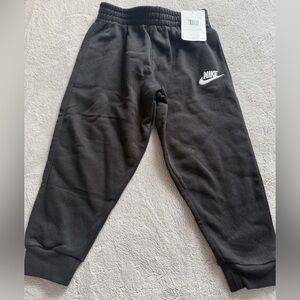 Nike Black Kids Jogger Sweatpants with White Swoosh